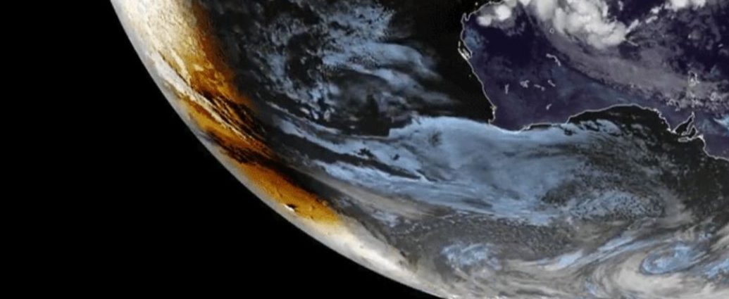 Antarctica solar eclipse - Satellite view of moon's shadow during solar eclipse over white Antarctic landscape