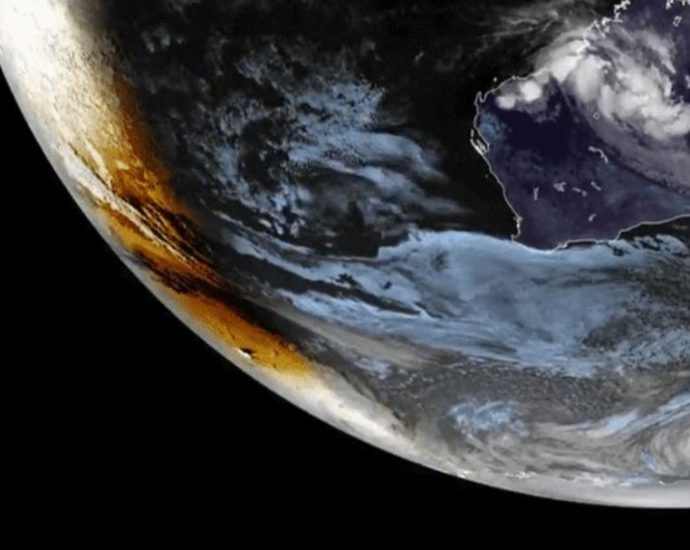 Antarctica solar eclipse - Satellite view of moon's shadow during solar eclipse over white Antarctic landscape