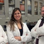bacteria eat cancer tumours - Cancer researchers working in a laboratory with medical equipment and samples