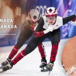 Canada bronze Olympic relay - Short track speed skaters racing around an oval ice track during a relay competition