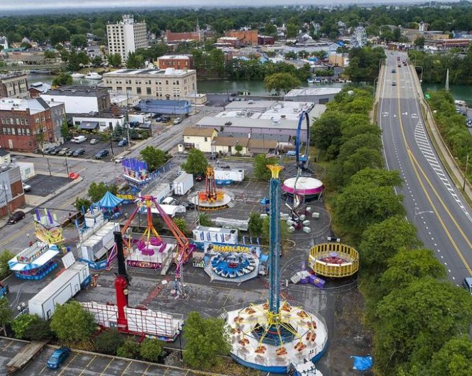Canal Fest North Tonawanda - Waterfront park with green space and trees, suitable for outdoor festivals and community events