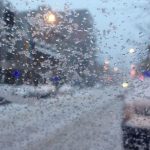 freezing drizzle waterloo - Icy road conditions with freezing rain coating pavement and vehicles