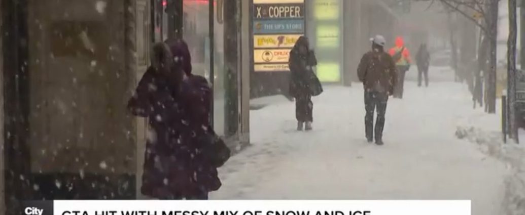 GTA winter storm - Cars driving through freezing rain and snow during a winter storm in Toronto