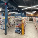Healthy Planet Toronto store - Interior of a modern health and wellness retail store with shelves of supplements and organic products