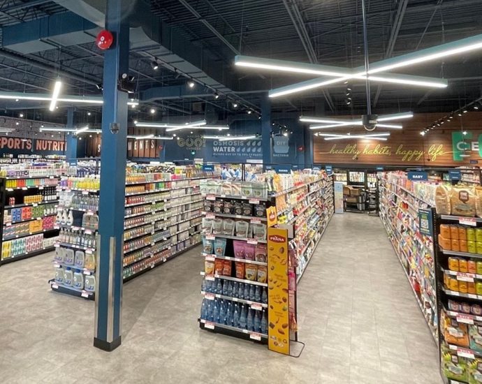 Healthy Planet Toronto store - Interior of a modern health and wellness retail store with shelves of supplements and organic products
