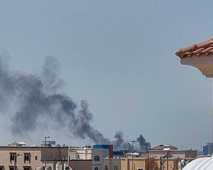 Iran strikes US bases - Military base under attack with smoke and explosions