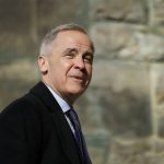 Mark Carney anti-Trump alliance - Mark Carney speaking at a political event, representing Canadian political leadership discussions