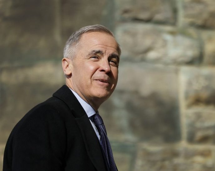 Mark Carney anti-Trump alliance - Mark Carney speaking at a political event, representing Canadian political leadership discussions