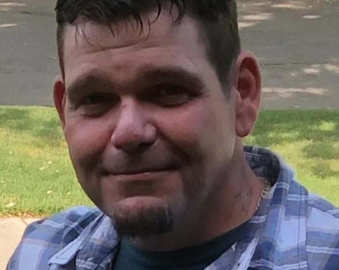 missing person Toronto - Police officers conducting search operation in urban residential area