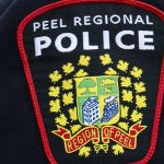 Mississauga police shooting - Police vehicles and investigators at a crime scene in Mississauga