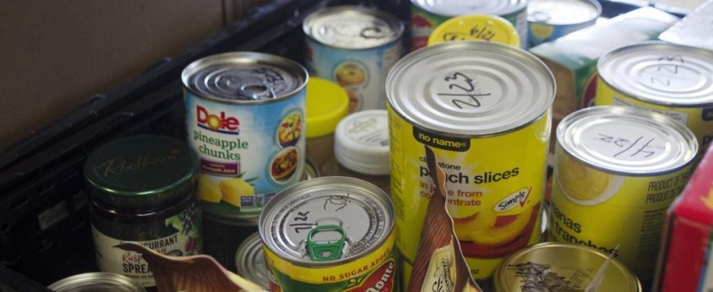 Oakville food banks - Volunteers organizing food donations at a community food bank