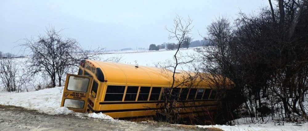 school bus crash - Emergency responders attending to a school bus incident scene