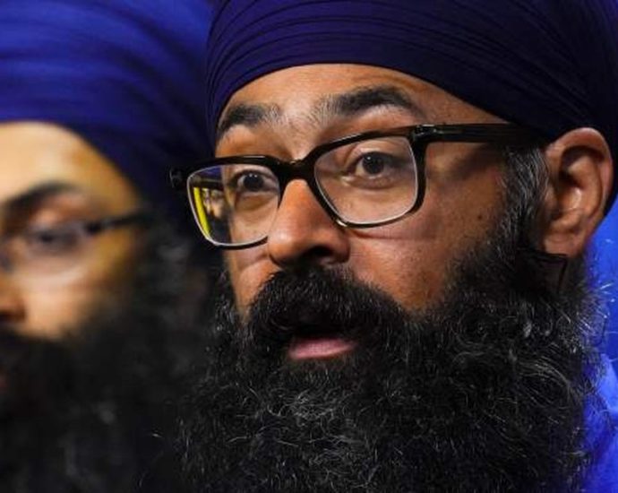 Sikh activist threat Canada - Members of Canada's Sikh community at a public gathering, representing the activists receiving police threat warnings