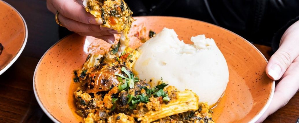 West African restaurants Toronto - Colorful West African dishes including jollof rice and grilled meat served at a Toronto restaurant
