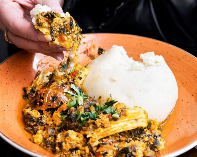 West African restaurants Toronto - Colorful West African dishes including jollof rice and grilled meat served at a Toronto restaurant