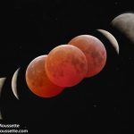 blood moon eclipse Canada - Red-tinted Moon during total lunar eclipse against dark sky