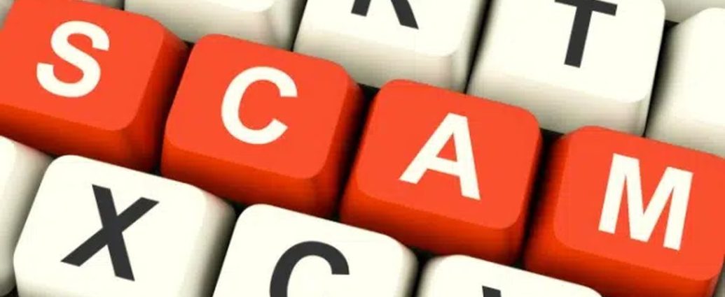 CRA tax scams - Person looking at phone with suspicious caller, representing CRA tax scam awareness
