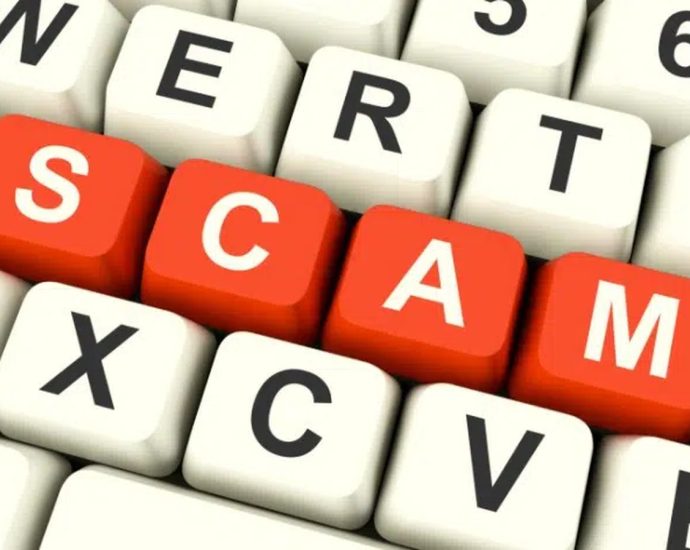 CRA tax scams - Person looking at phone with suspicious caller, representing CRA tax scam awareness