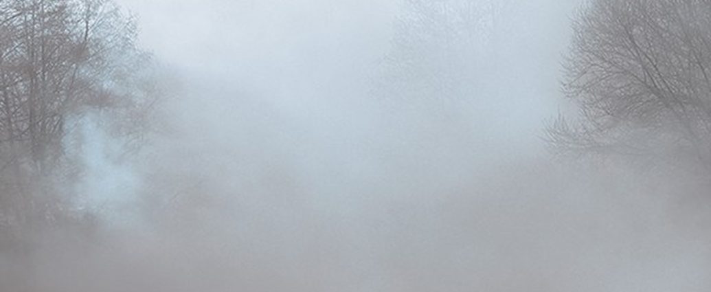 fog advisory Ontario - Dense fog covering a highway in southwestern Ontario reducing visibility