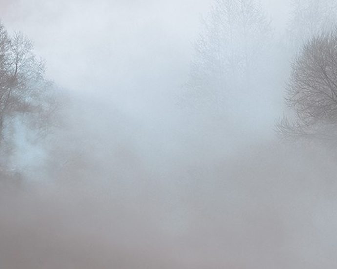 fog advisory Ontario - Dense fog covering a highway in southwestern Ontario reducing visibility