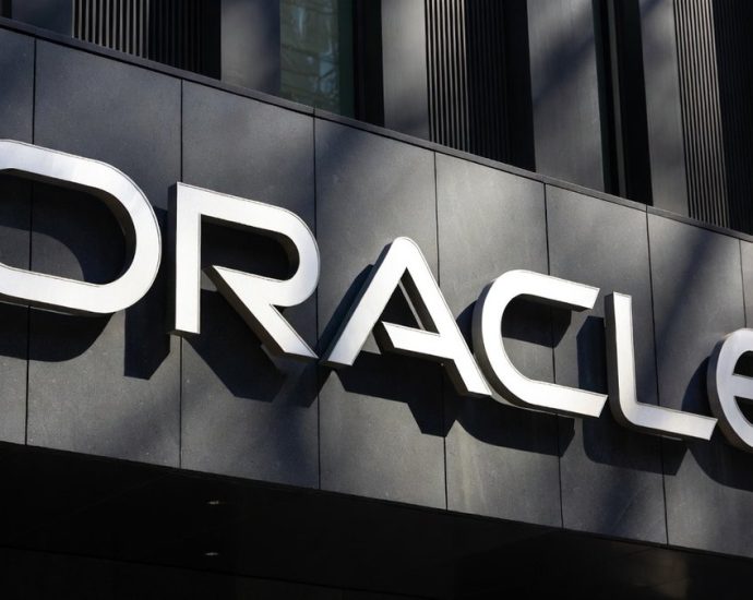 Oracle layoffs - Oracle corporate headquarters building with company logo visible