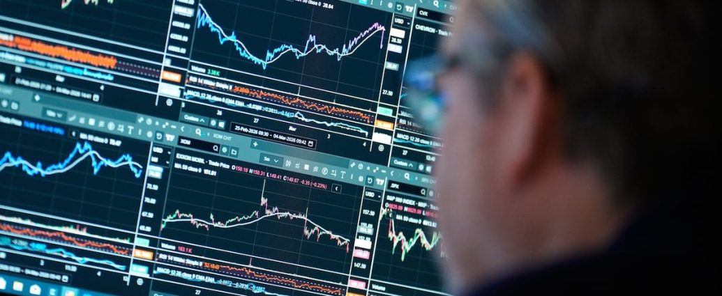 Trump tariffs Canadian stocks - Stock market trading screens showing Canadian financial data and investment charts