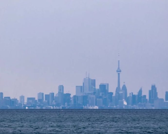 winter air quality warning - Hazy city skyline showing poor air quality conditions over urban area