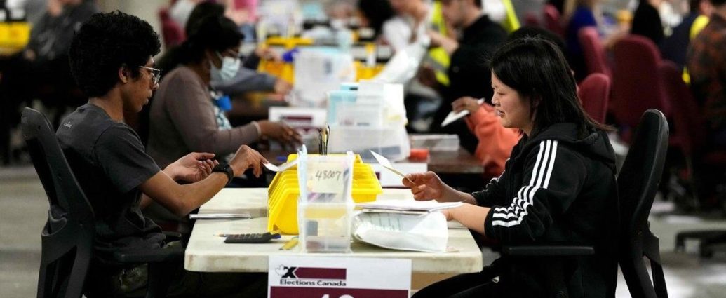 April 13 byelections - Canadian voters casting ballots at a polling station during a federal byelection