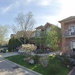 Brampton shooting - Police officers investigating a crime scene with yellow tape
