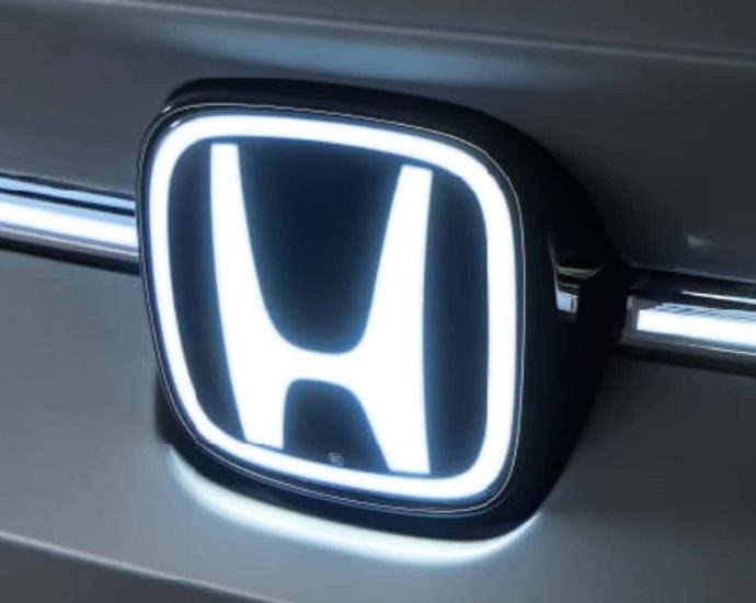 Honda Chinese suppliers - Honda automotive manufacturing facility with production line and vehicles