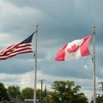 51st state - Canadian and American flags flying side by side