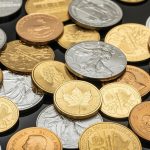 Canadian dollar coins and banknotes representing the Bank of Canada interest rate decision